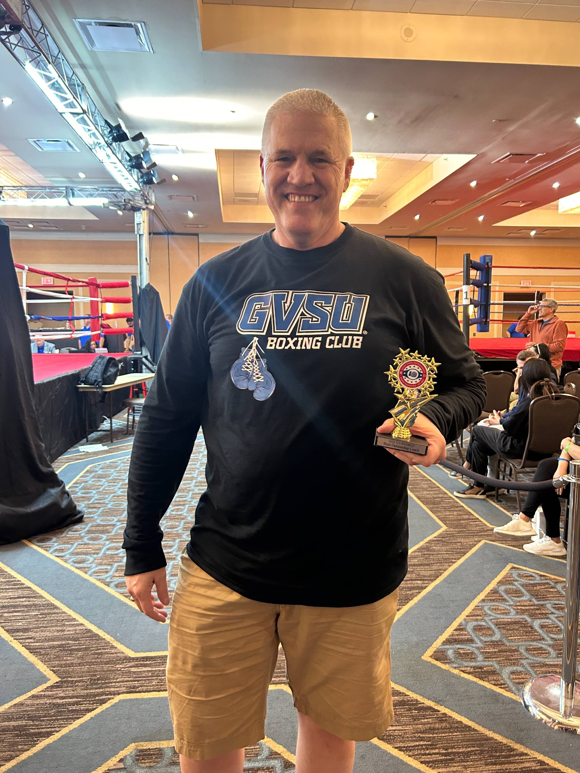 Coach Dennis with "Coach of the Year" Award